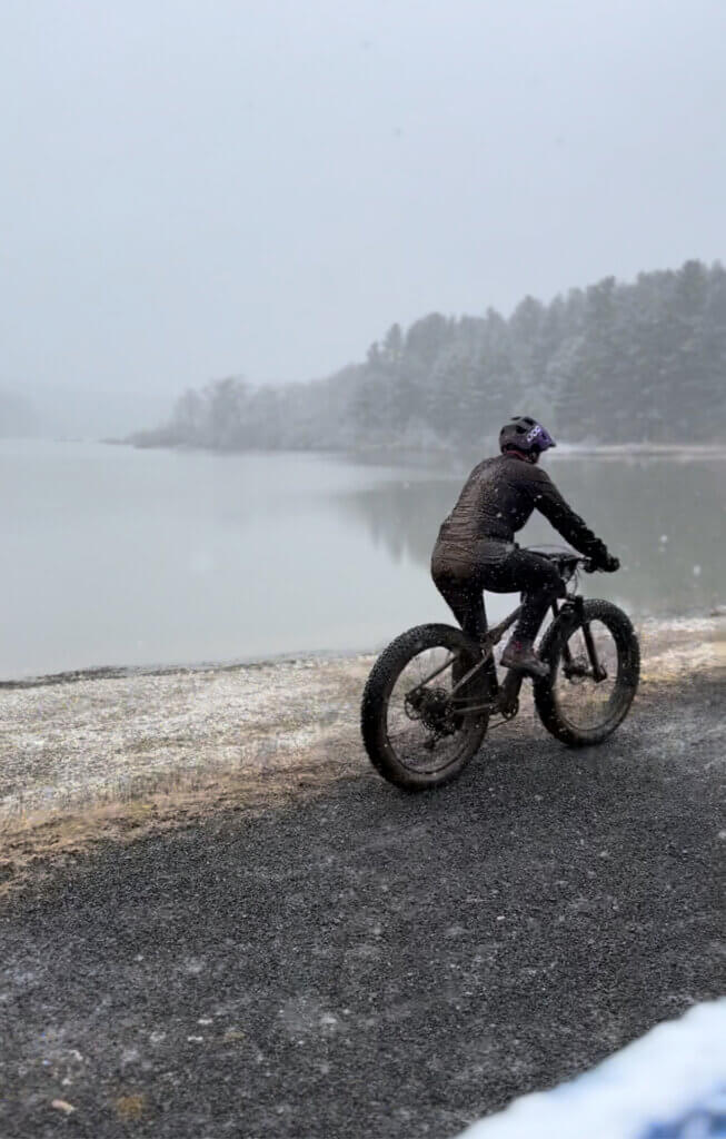A rider - Sue Haywood - enjoys the winter scenery at Herrington Manor State Park