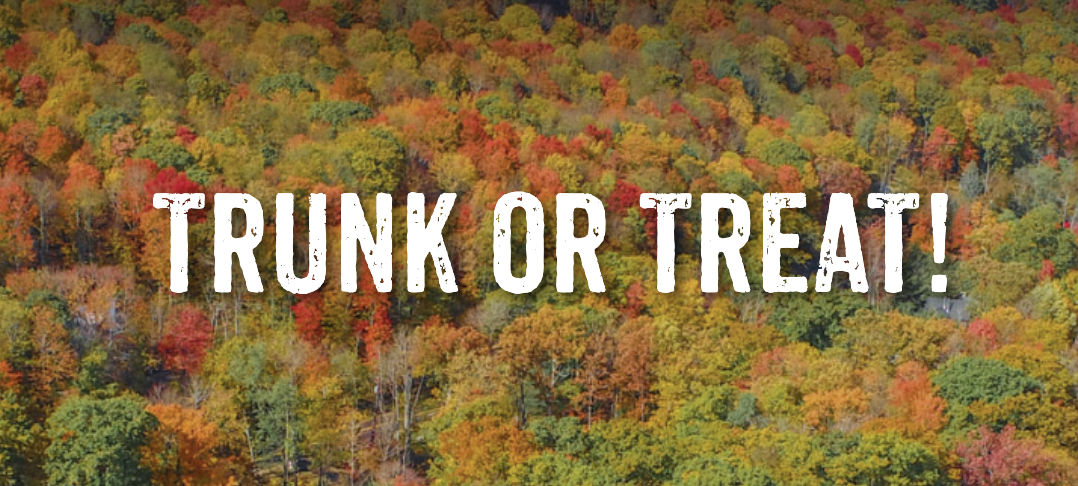Trunk or Treat over a hillside of fall foliage