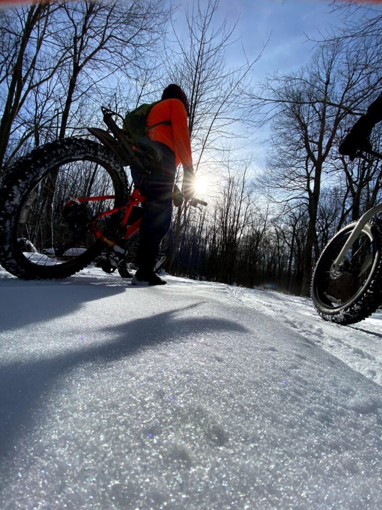 Fat bikes on a sunny snowy trail in Savage River State Forest